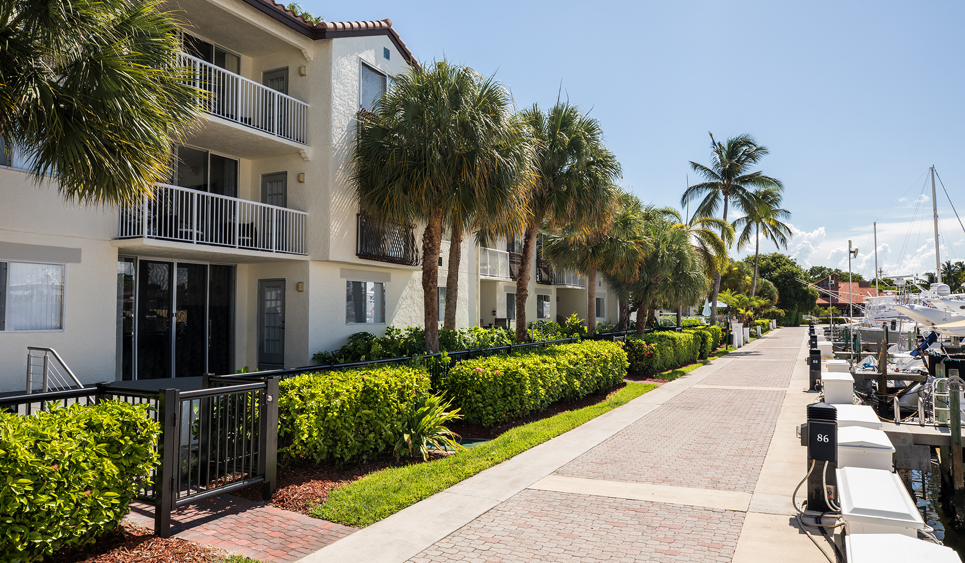 Waterways Village - Aventura, FL - Patios along walkway next to marina